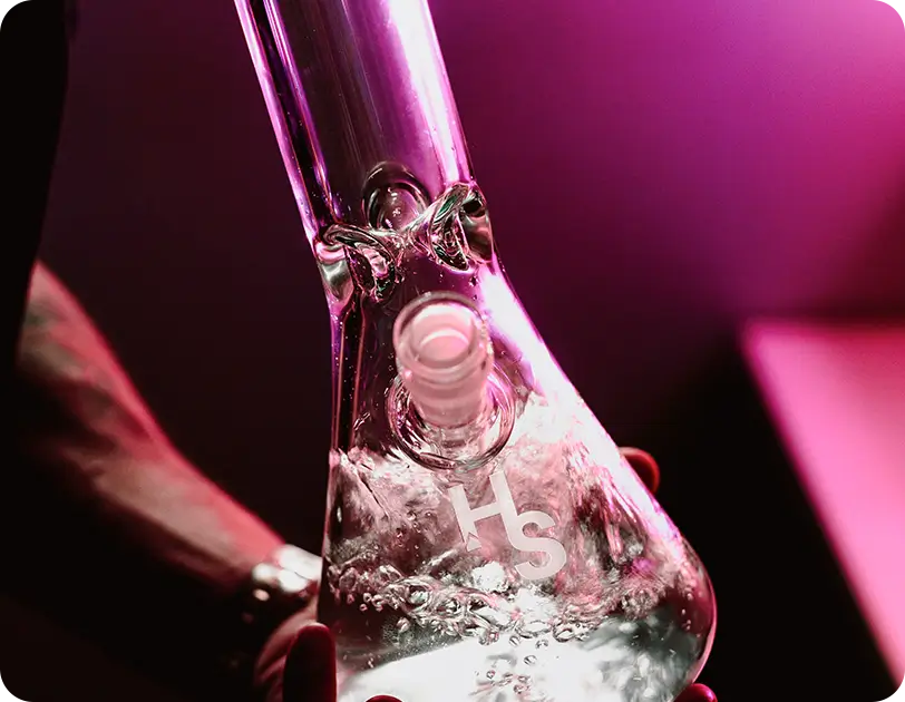 HS glass bong with a sleek, modern design and percolator, offered by the online headshop.